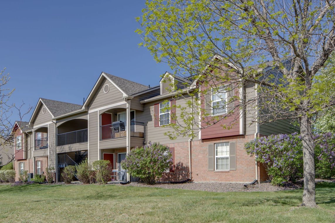 Building exterior with balconies and patios